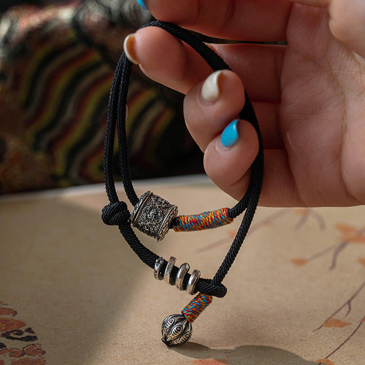 Braccialetto a doppio giro con amuleto intagliato in Buddha Stones tibetano Om Mani Padme Hum