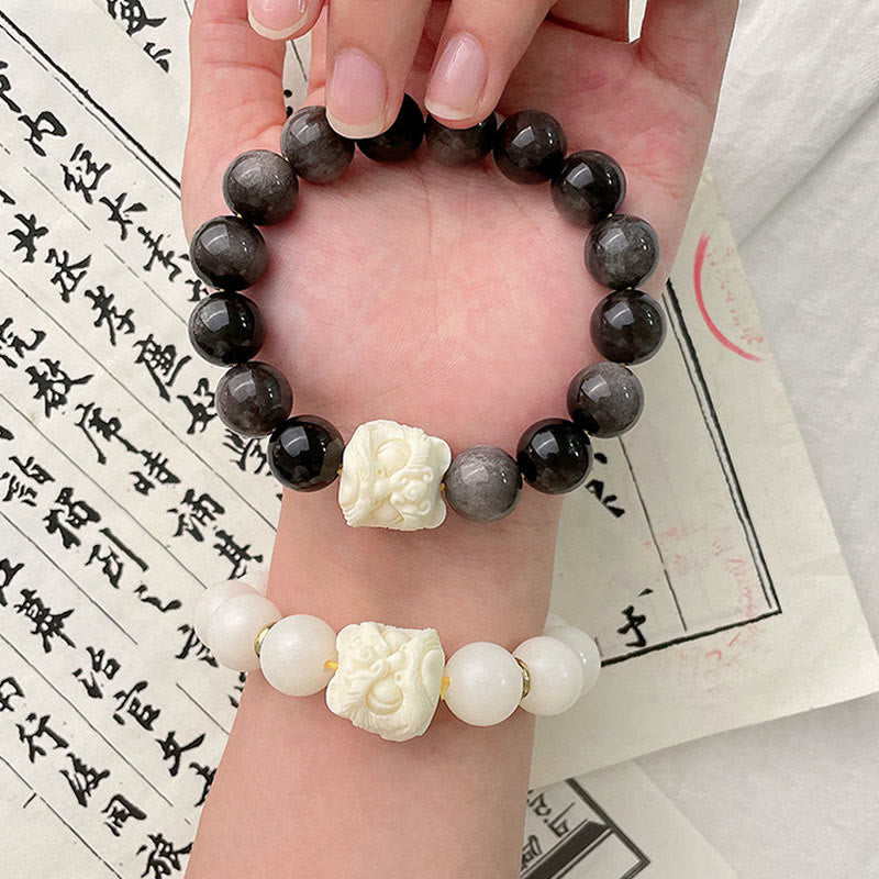 Braccialetto di protezione con leone danzante , Buddha Stones di avorio, seme di Bodhi, pietre di Buddha, argento lucido e ossidiana