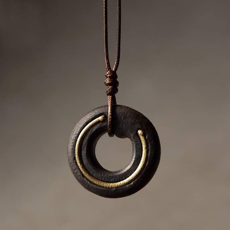 Collana con ciondolo in legno di ebano, cerchio zen, Buddha Stones , pace e calma - Legno di ebano - image 0