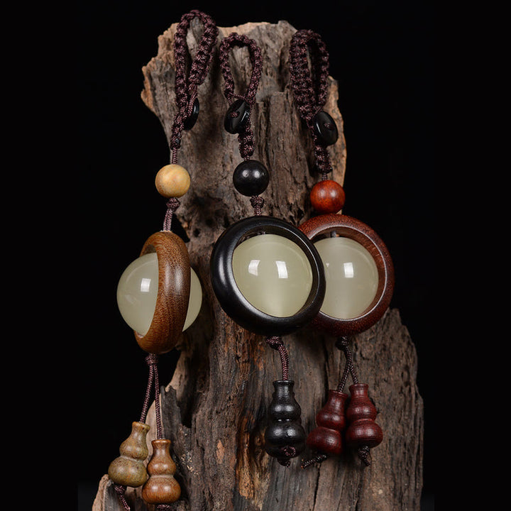 Buddha Stones Sandalo rosso Legno di ebano Sandalo verde Perlina portafortuna luminosa Zucca Portachiavi della pace