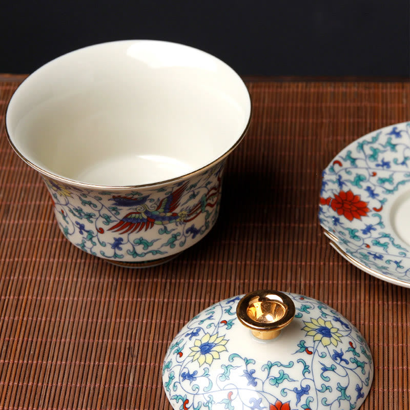 Buddha Stones Retro Prugna Fiore Pino Bambù Fenice Kirin Ceramica Gaiwan Sancai Tazza da tè Kung Fu Tazza da tè e piattino con coperchio
