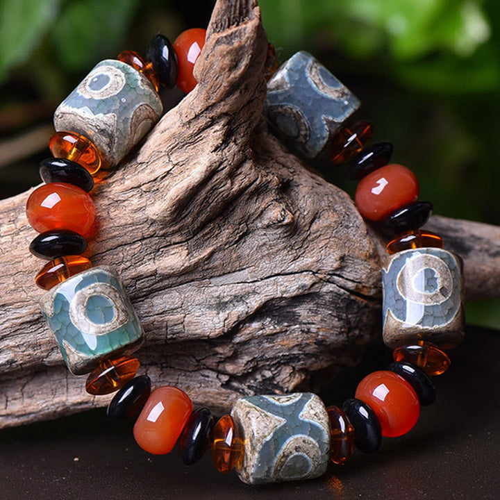 Braccialetto di protezione della felicità con perline Dzi a tre occhi tibetane Buddha Stones