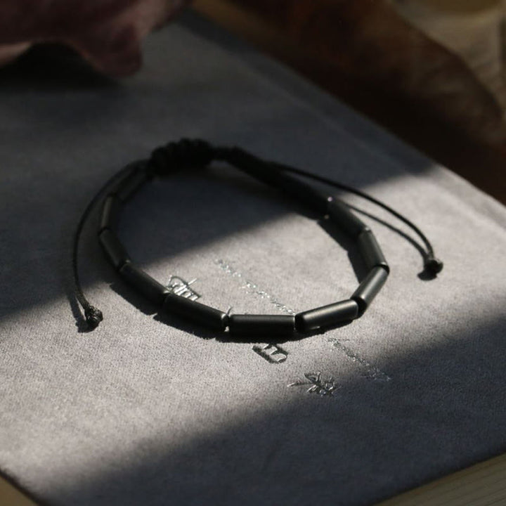 Braccialetto di protezione e supporto con perline di onice nero Buddha Stones