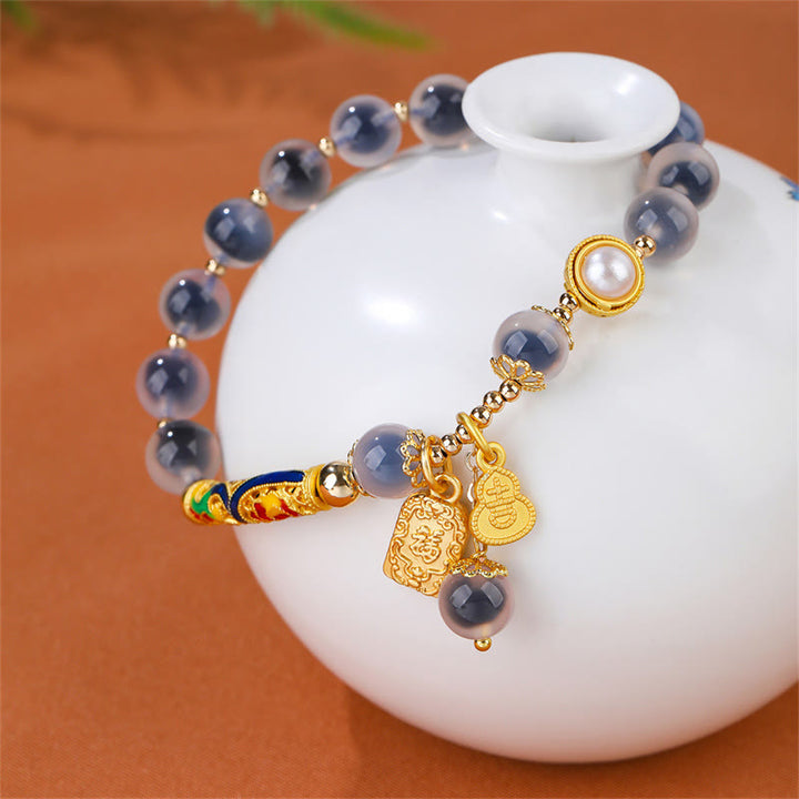 Braccialetto di forza con amuleto in agata blu caramella naturale Buddha Stones