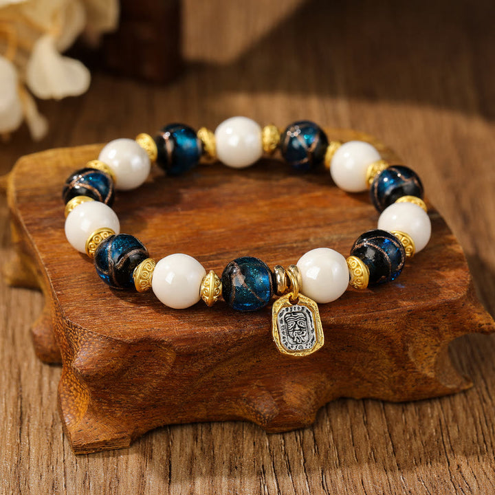 Buddha Stones Tibetano Zakiram Dea della Ricchezza Ciondolo Liuli Vetro Incenso Cenere Perline di Porcellana Braccialetto di Protezione