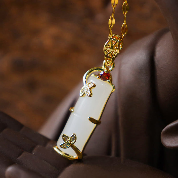 Collana con ciondolo di protezione dalla fortuna in bambù, giada bianca e giada ciano Buddha Stones