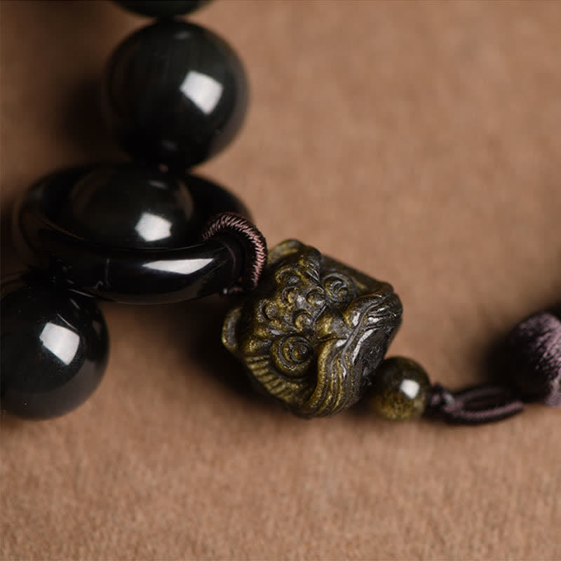 Buddha Stones Ossidiana nera naturale Leone Mala da polso Protezione Nappe Mala tascabile Decorazione per auto