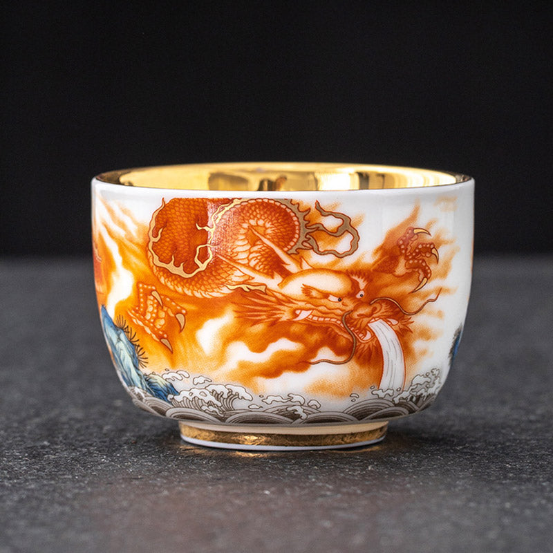 Buddha Stones Drago Fenice Gru Sole Oceano Onde Tazza da tè in ceramica dorata Tazza da tè Kung Fu 170ml