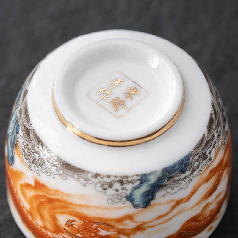 Buddha Stones Drago Fenice Gru Sole Oceano Onde Tazza da tè in ceramica dorata Tazza da tè Kung Fu 170ml