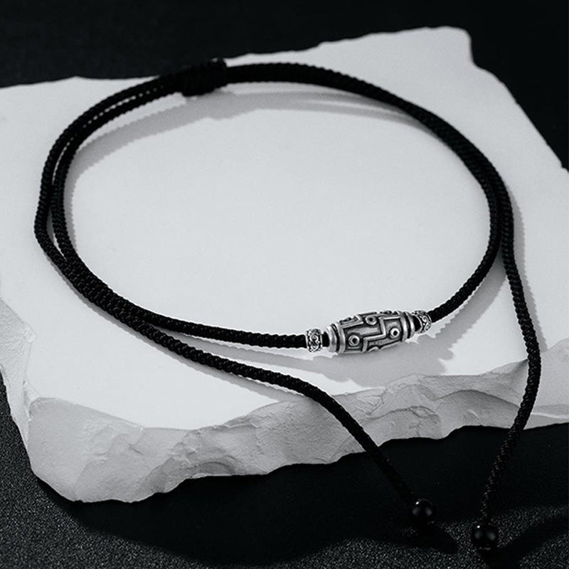Collana con ciondolo in corda di protezione con motivo a nove occhi Dzi in argento sterling 999 Buddha Stones - image 3