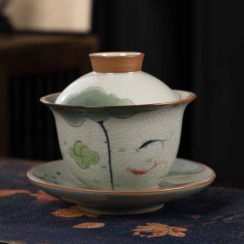Buddha Stones Lotus Koi Fish Pod Leaf Ceramic Gaiwan Sancai Tazza da tè Kung Fu Tazza da tè e piattino con coperchio 140ml