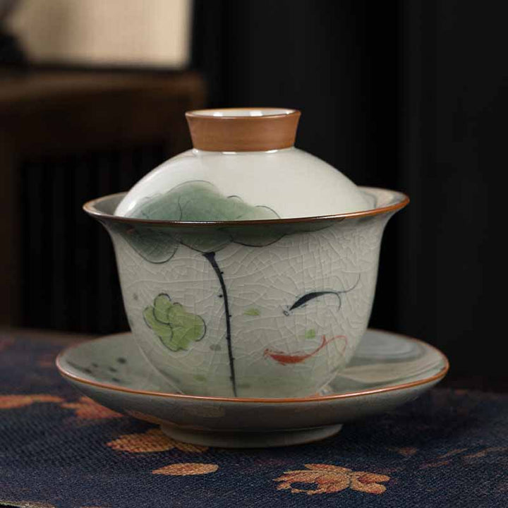 Buddha Stones Lotus Koi Fish Pod Leaf Ceramic Gaiwan Sancai Tazza da tè Kung Fu Tazza da tè e piattino con coperchio 140ml