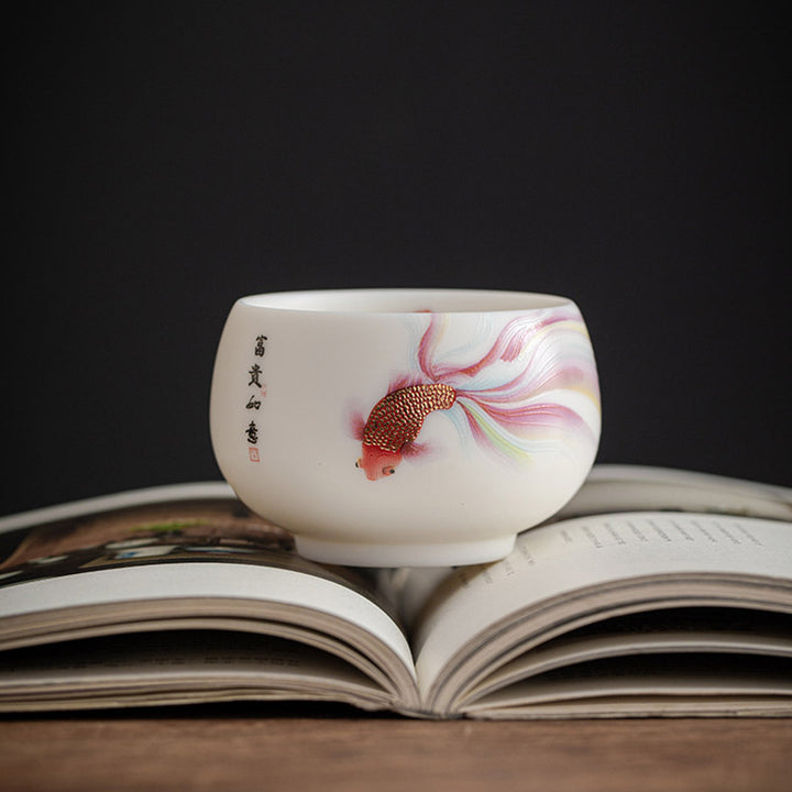 Buddha Stones Koi Fish Tazza da tè in porcellana bianca Tazza da tè in ceramica Kung Fu