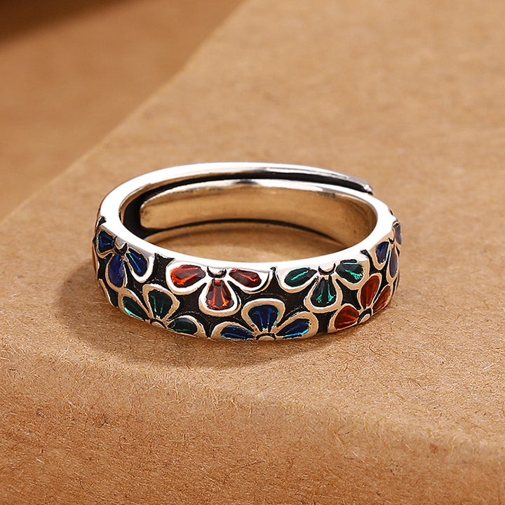 Anello regolabile in rame con design di fiori di prugna colorati Buddha Stones