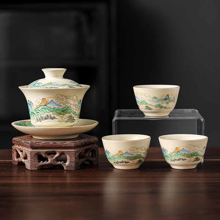 Buddha Stones Un panorama di fiumi e montagne Fiori Gaiwan in ceramica Sancai Tazza da tè Tazza da tè Kung Fu e piattino con coperchio - 4 pezzi Panorama di fiumi e montagne (1 pezzo 12 cm * 9 cm * 100 ml e 3 pezzi 6,5 * 4 cm * 40 ml) - image 13