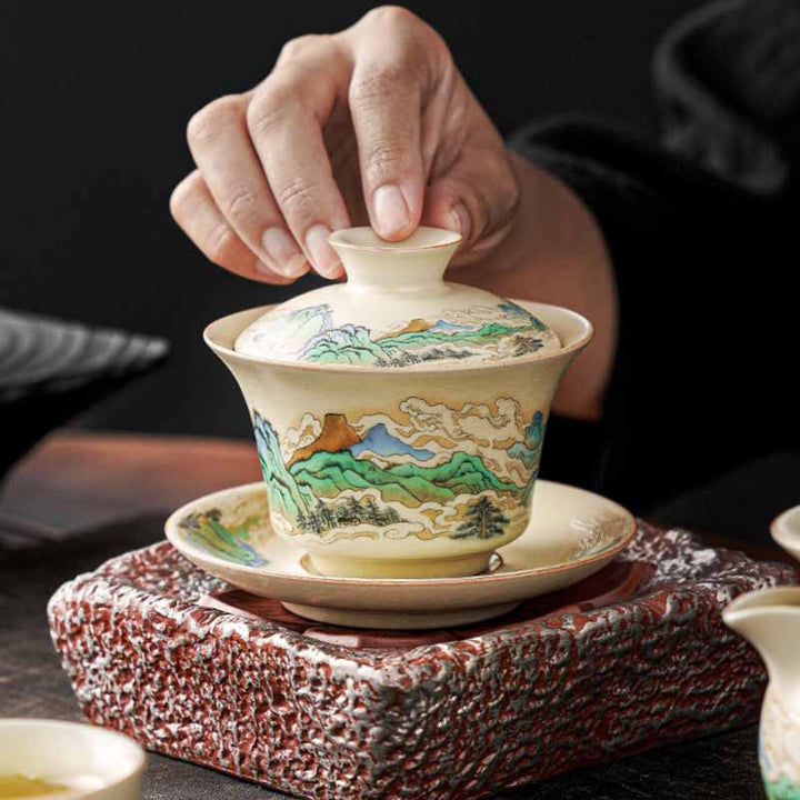 Buddha Stones Un panorama di fiumi e montagne Fiori Gaiwan in ceramica Sancai Tazza da tè Tazza da tè Kung Fu e piattino con coperchio - image 3