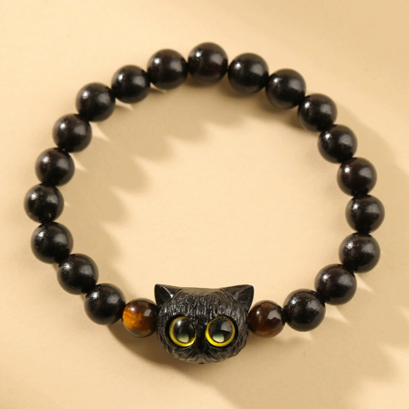 Braccialetto della pace con motivo a testa di gatto in legno di ebano Buddha Stones - Occhio di tigre di gatto ebano (circonferenza polso 14-16 cm) - image 1