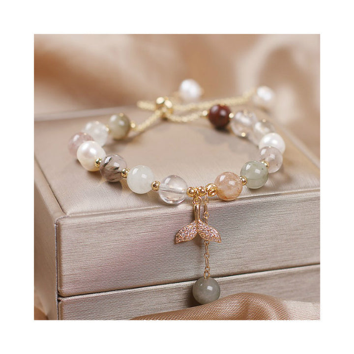Braccialetto curativo con ciondolo a coda di pesce in quarzo rutilato e quarzo fragola Buddha Stones