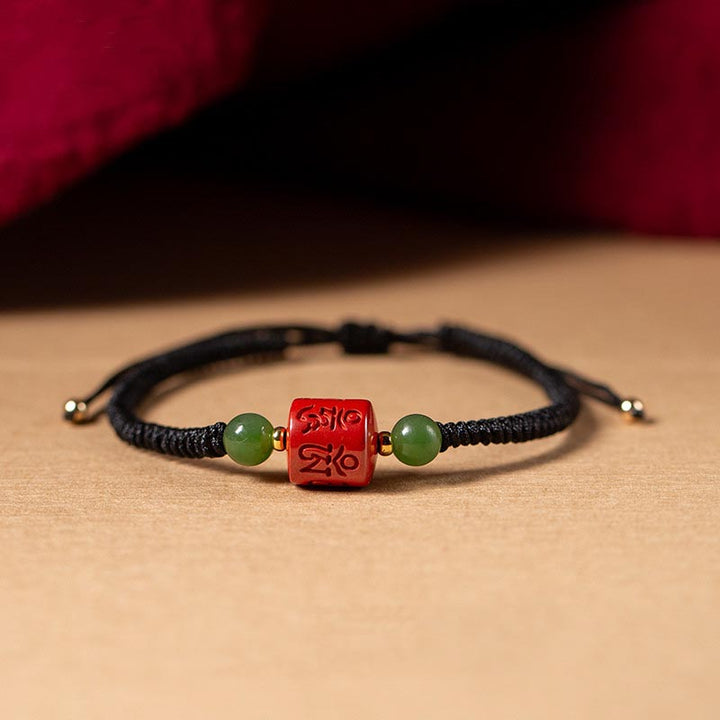 Buddha Stones Tibetam Cinnabar Om Mani Padme Hum Braccialetto di corda intrecciata con incisione di benedizione