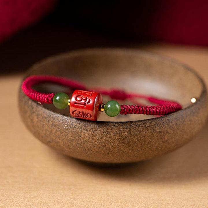 Buddha Stones Tibetam Cinnabar Om Mani Padme Hum Braccialetto di corda intrecciata con incisione di benedizione