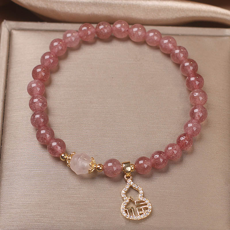 Braccialetto positivo con ciondolo a forma di carattere Fu di zucca e quarzo fragola Buddha Stones