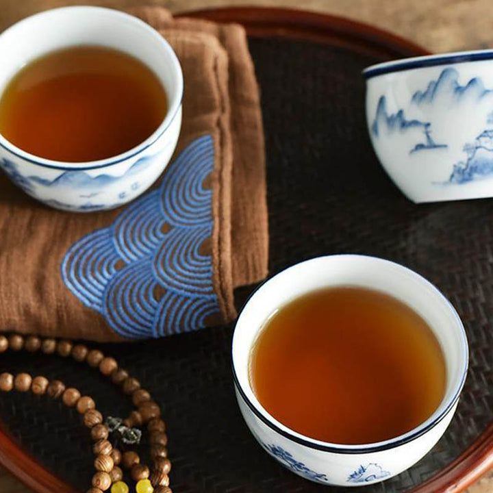 Buddha Stones Koi Pesce Fiore di Loto Foglia Montagne Albero Tazza da Tè in Ceramica Tazza da Tè Kung Fu 130ml