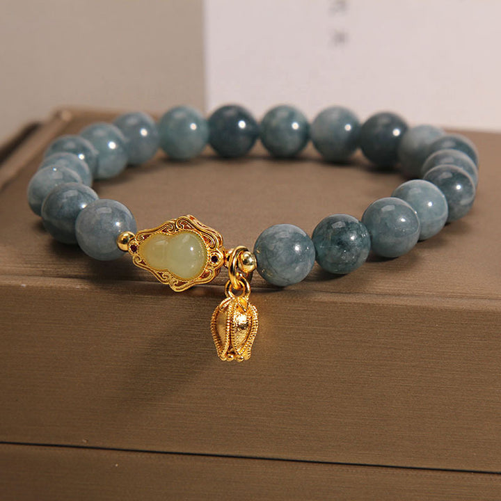 Braccialetto portafortuna con ciondolo tulipano zucca giada naturale Buddha Stones