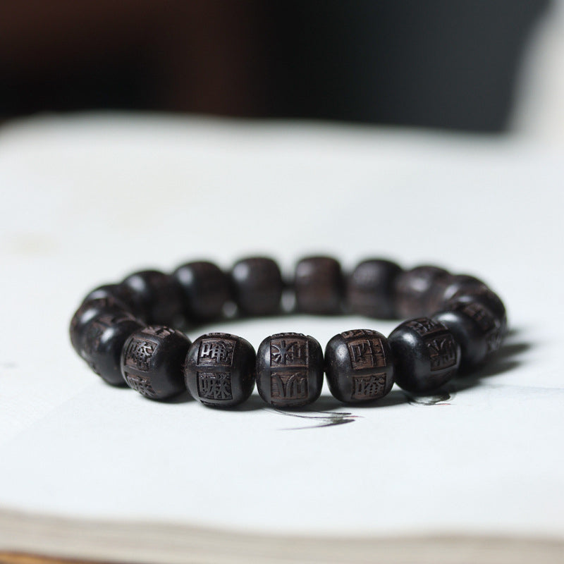 Braccialetto di equilibrio inciso in legno di Buddha Stones tibetano Om Mani Padme Hum