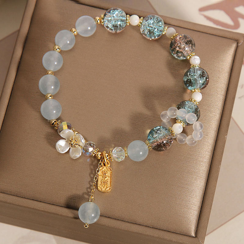 Braccialetto di guarigione naturale con fiore di calcedonio, ametista e cristallo blu Buddha Stones