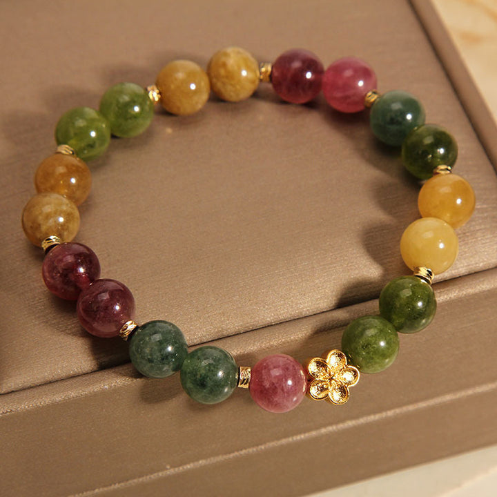Braccialetto positivo con fiore dorato in tormalina colorata naturale Buddha Stones