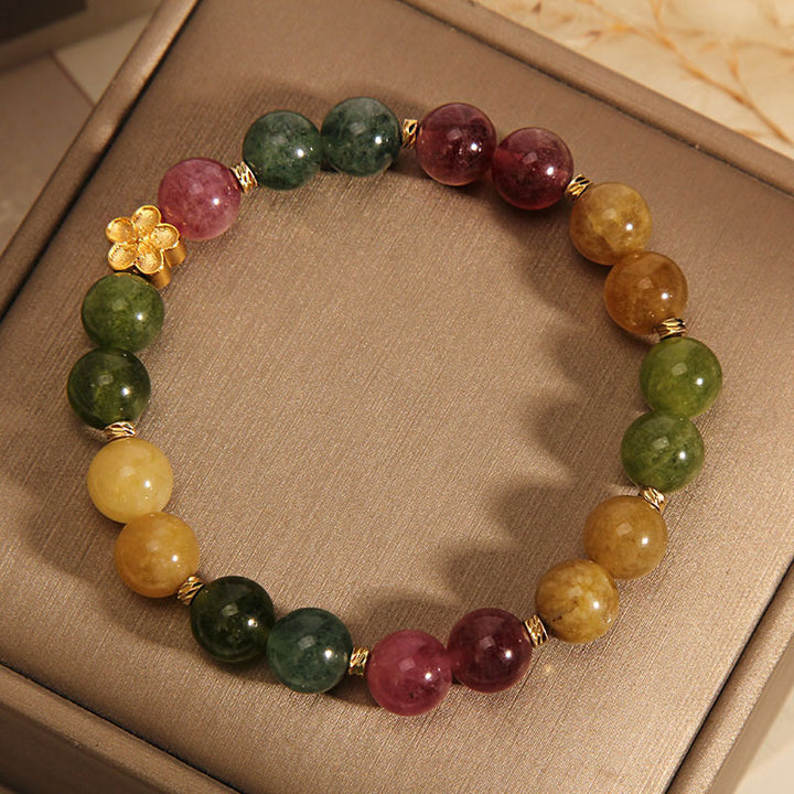 Braccialetto positivo con fiore dorato in tormalina colorata naturale Buddha Stones