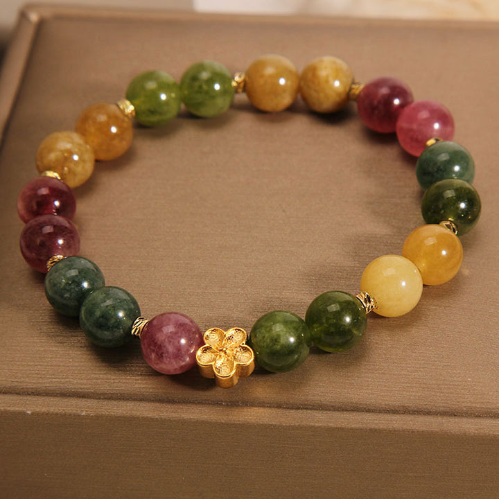 Braccialetto positivo con fiore dorato in tormalina colorata naturale Buddha Stones