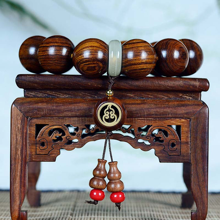 Braccialetto con ciondolo a forma di zucca, calore e calma, in palissandro , Buddha Stones