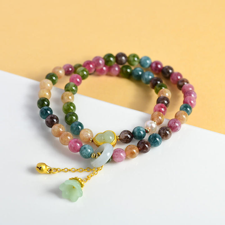 Braccialetto con ciondolo a doppio giro di mughetto con tormalina multicolore , Buddha Stones