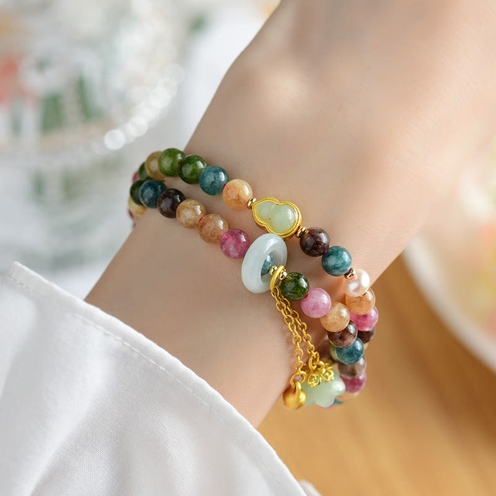 Braccialetto con ciondolo a doppio giro di mughetto con tormalina multicolore , Buddha Stones