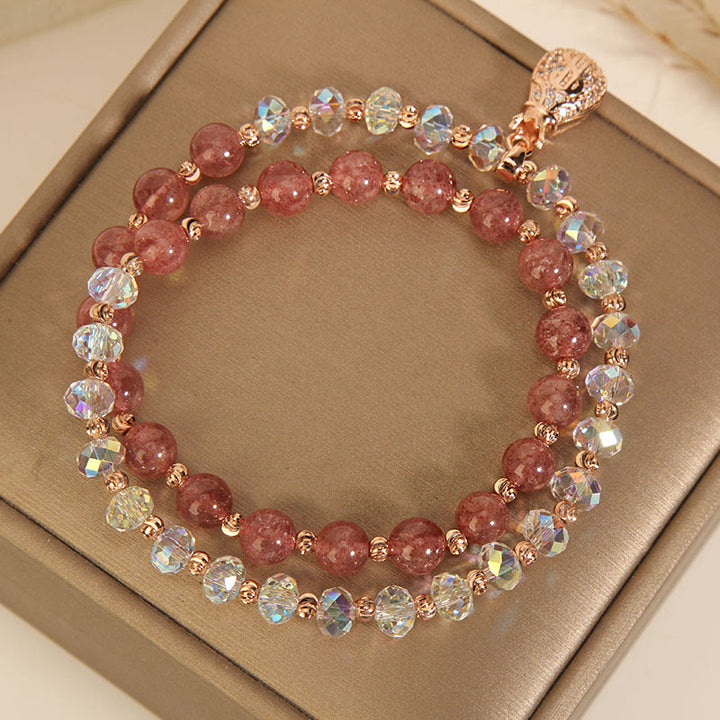 Braccialetto positivo con ciondolo a forma di borsa per soldi in cristallo bianco e quarzo fragola Buddha Stones