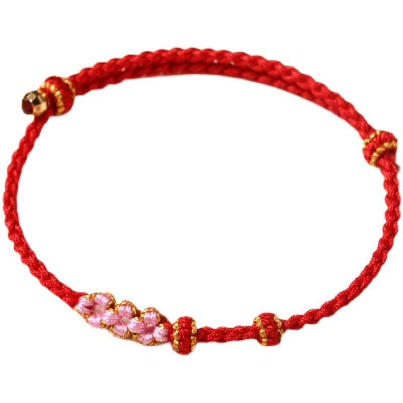Braccialetto di corda intrecciata con protezione in fiore di pesco fatto a mano Buddha Stones