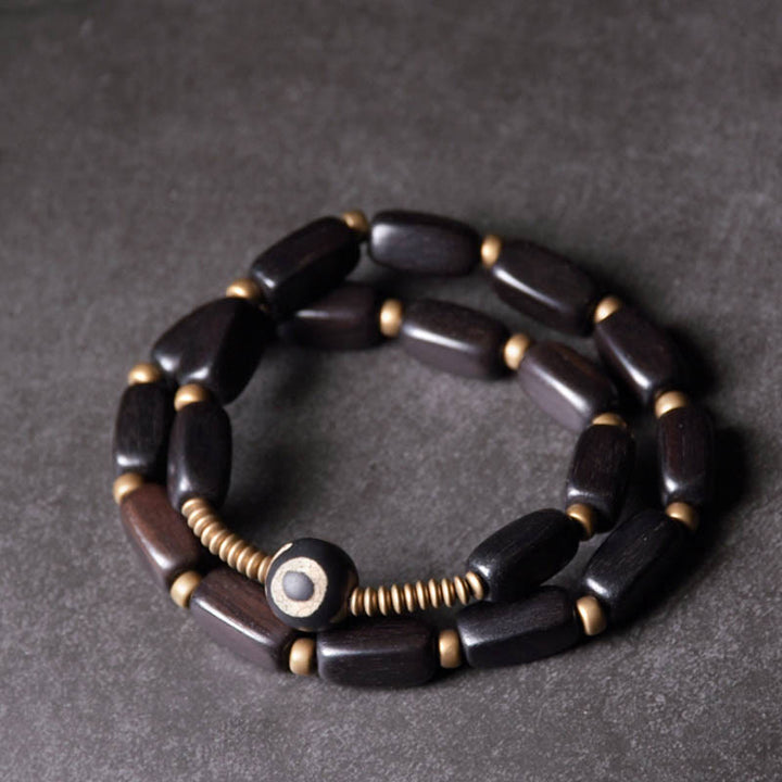 Braccialetto doppio giro in rame con perline di legno di Buddha Stones del Tibet Dzi