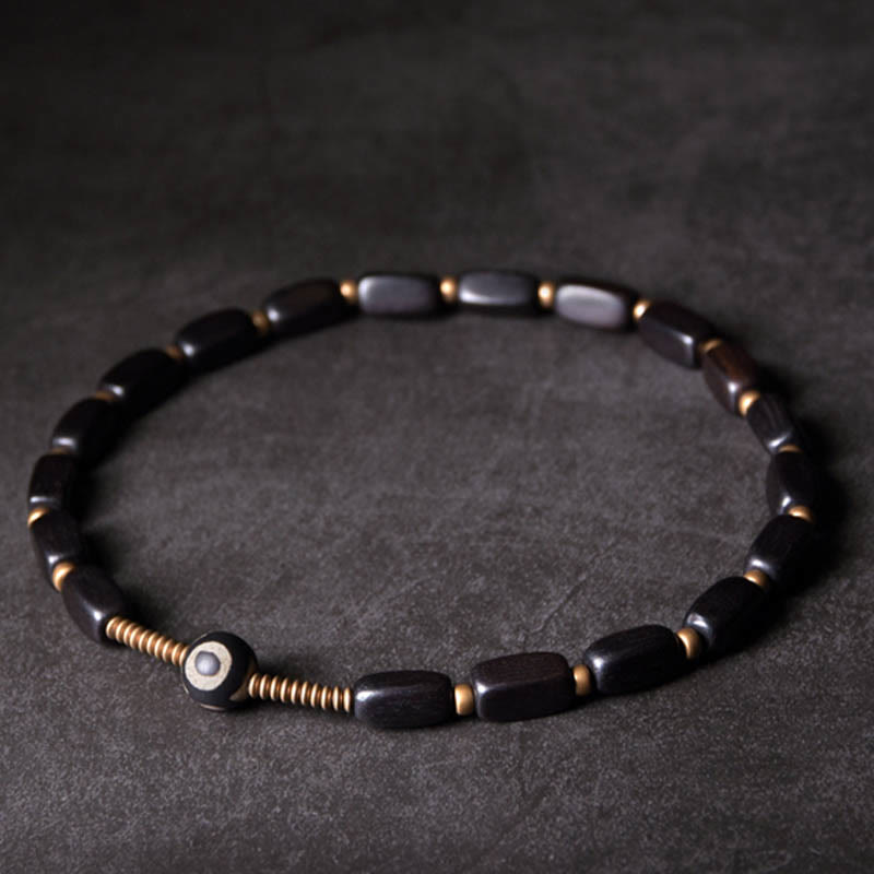 Braccialetto doppio giro in rame con perline di legno di Buddha Stones del Tibet Dzi