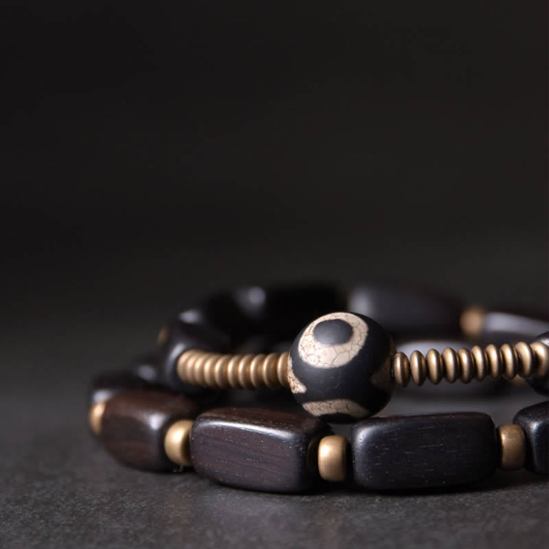 Braccialetto doppio giro in rame con perline di legno di Buddha Stones del Tibet Dzi