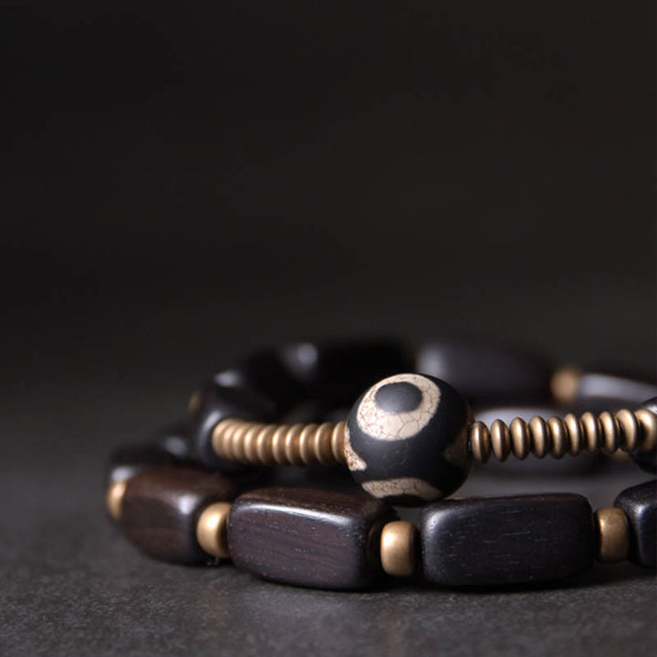 Braccialetto doppio giro in rame con perline di legno di Buddha Stones del Tibet Dzi