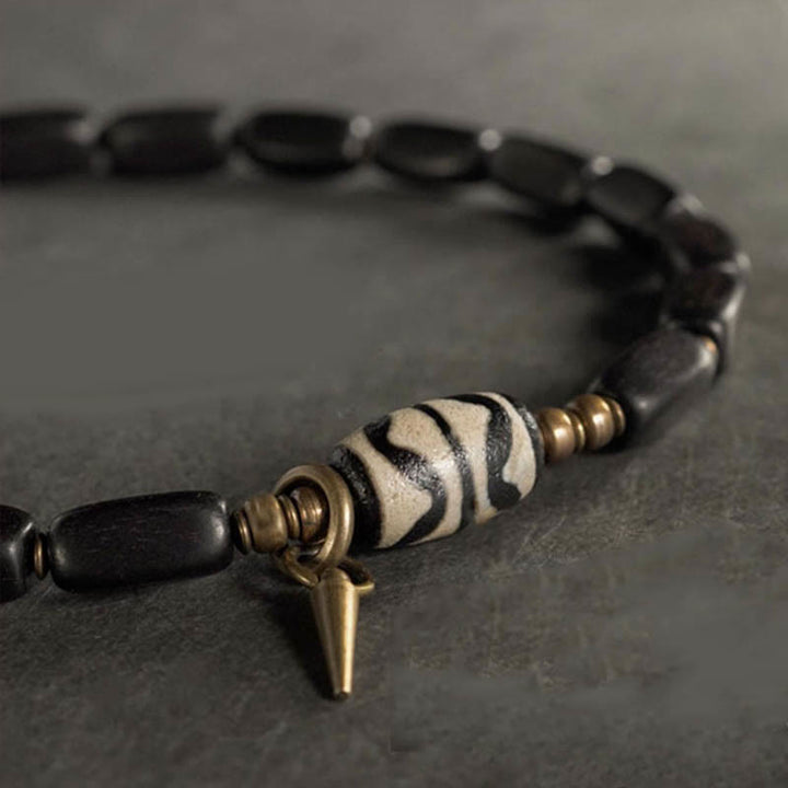 Braccialetto doppio giro in rame con perline di legno di Buddha Stones del Tibet Dzi