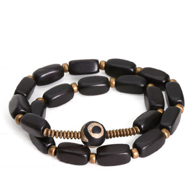 Braccialetto doppio giro in rame con perline di legno di Buddha Stones del Tibet Dzi