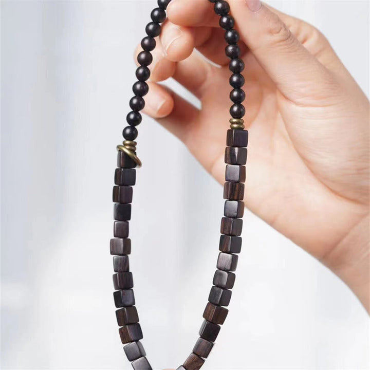 Braccialetto doppio giro in perle quadrate in legno di ebano tibetano Buddha Stones Peace