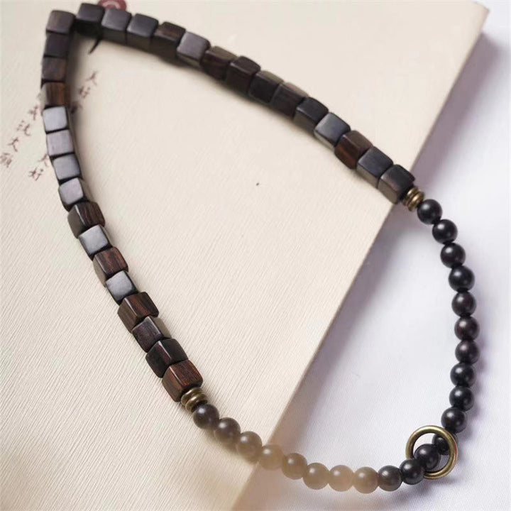 Braccialetto doppio giro in perle quadrate in legno di ebano tibetano Buddha Stones Peace