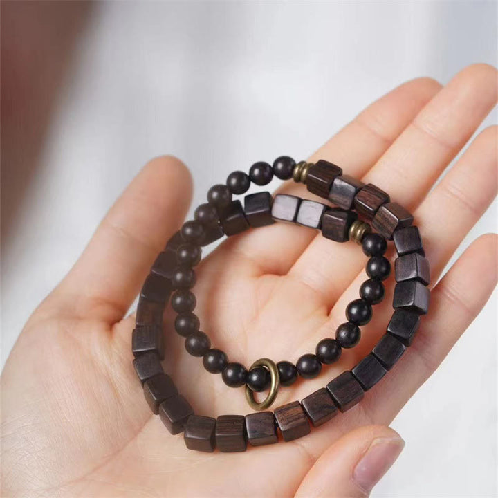 Braccialetto doppio giro in perle quadrate in legno di ebano tibetano Buddha Stones Peace