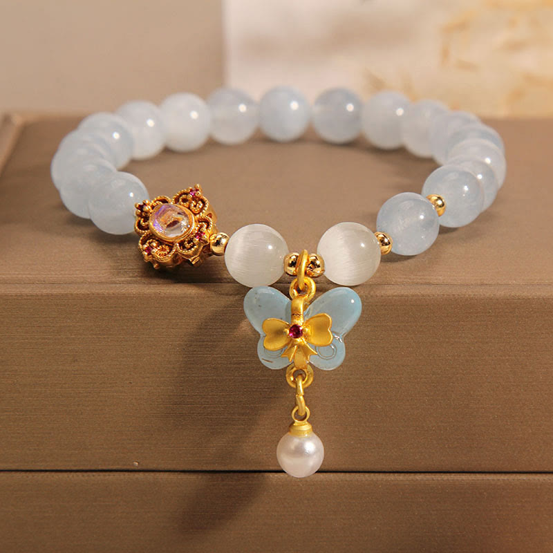 Braccialetto con ciondolo a forma di farfalla e perla con occhio di gatto e pietre Buddha Stones