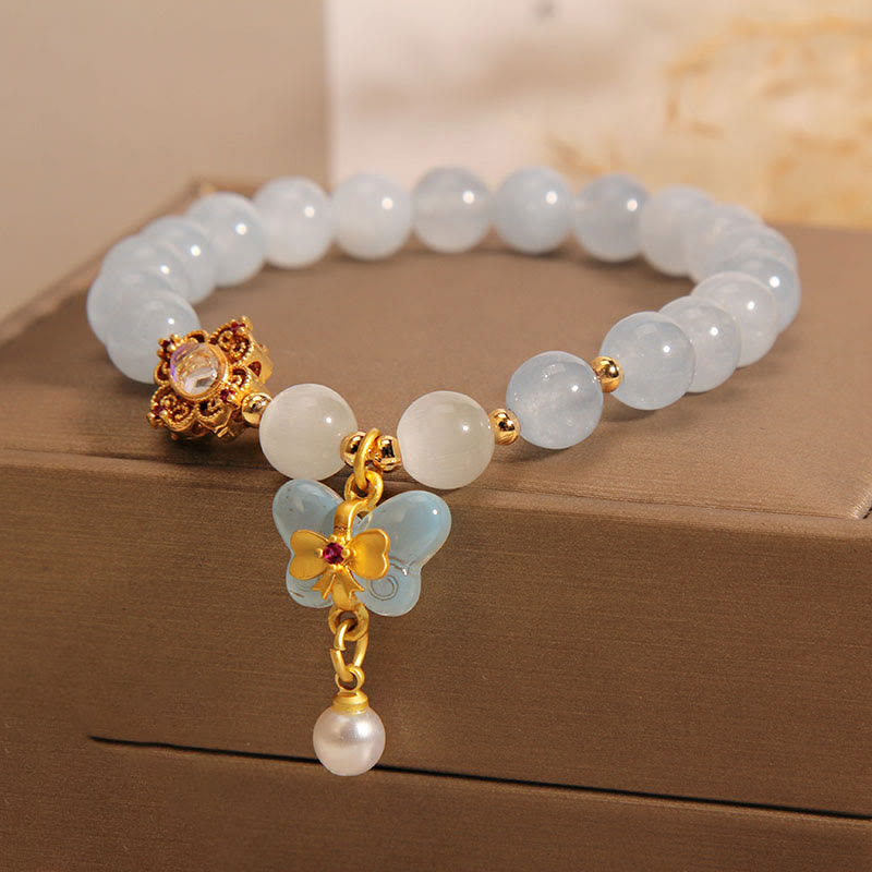 Braccialetto con ciondolo a forma di farfalla e perla con occhio di gatto e pietre Buddha Stones