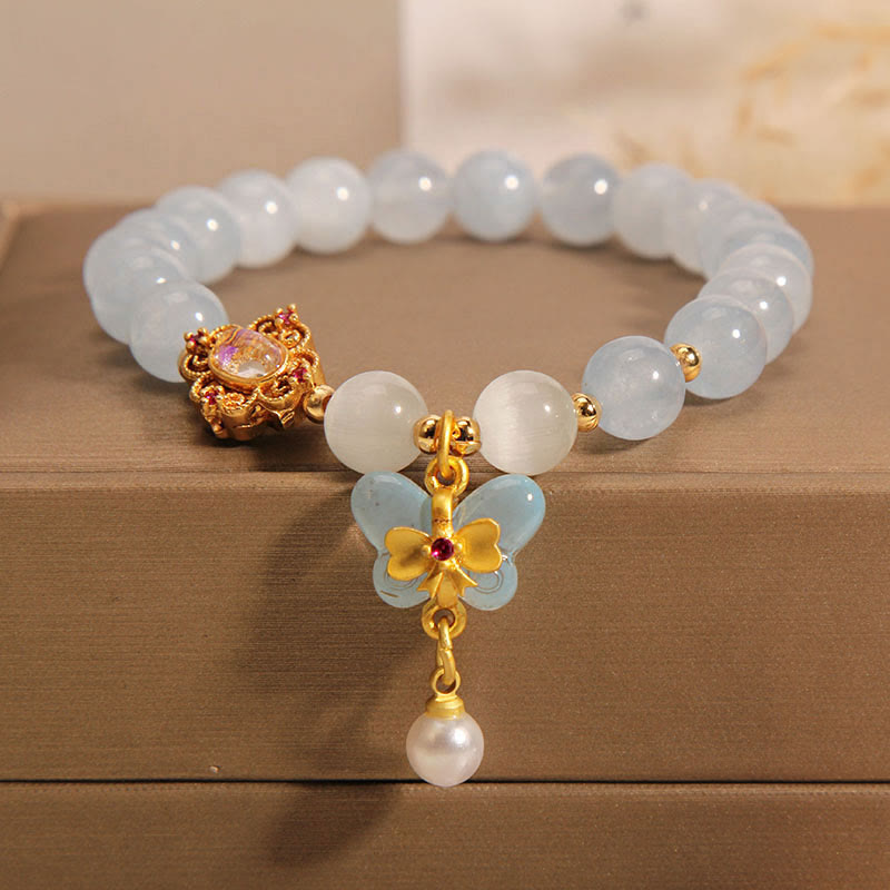 Braccialetto con ciondolo a forma di farfalla e perla con occhio di gatto e pietre Buddha Stones