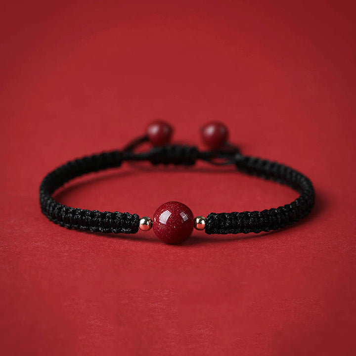Braccialetto con cordino rosso e perline di cinabro fortunato Buddha Stones